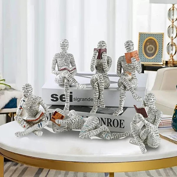 Artigianato di ornamenti in resina sotto forma di studioso