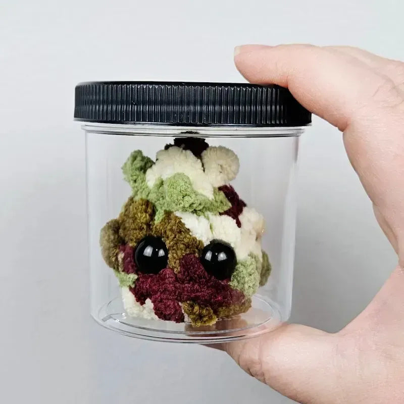 Adotta un peluche di pepite d'erba