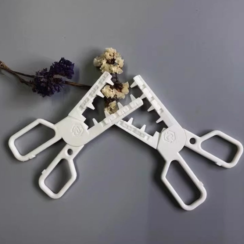 Clip separatore bobina antizanzare
