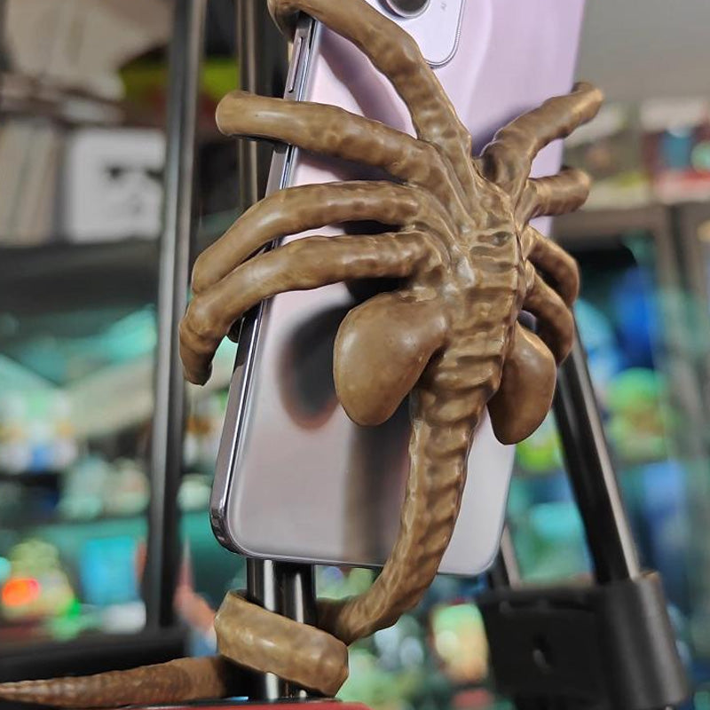Orribile supporto per telefono Facehugger