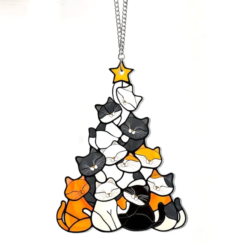 Gatto dell'albero di Natale che insegue il sole