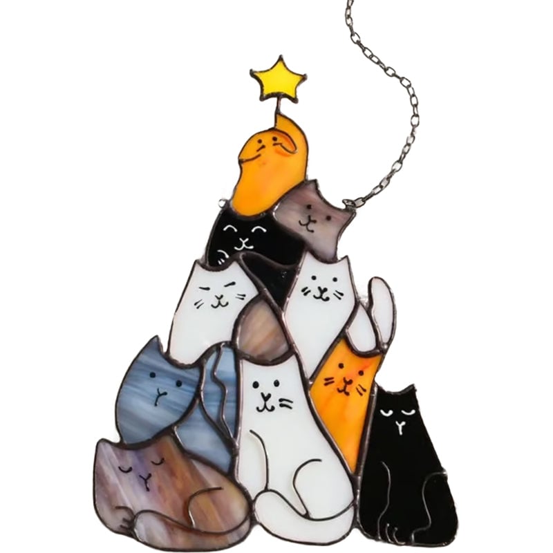 Gatto dell'albero di Natale che insegue il sole