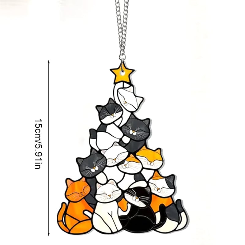 Gatto dell'albero di Natale che insegue il sole