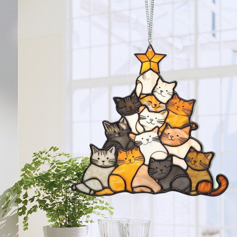 Gatto dell'albero di Natale che insegue il sole