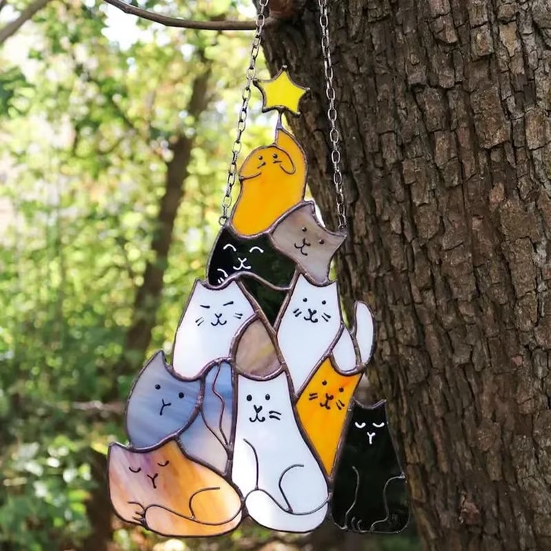 Gatto dell'albero di Natale che insegue il sole