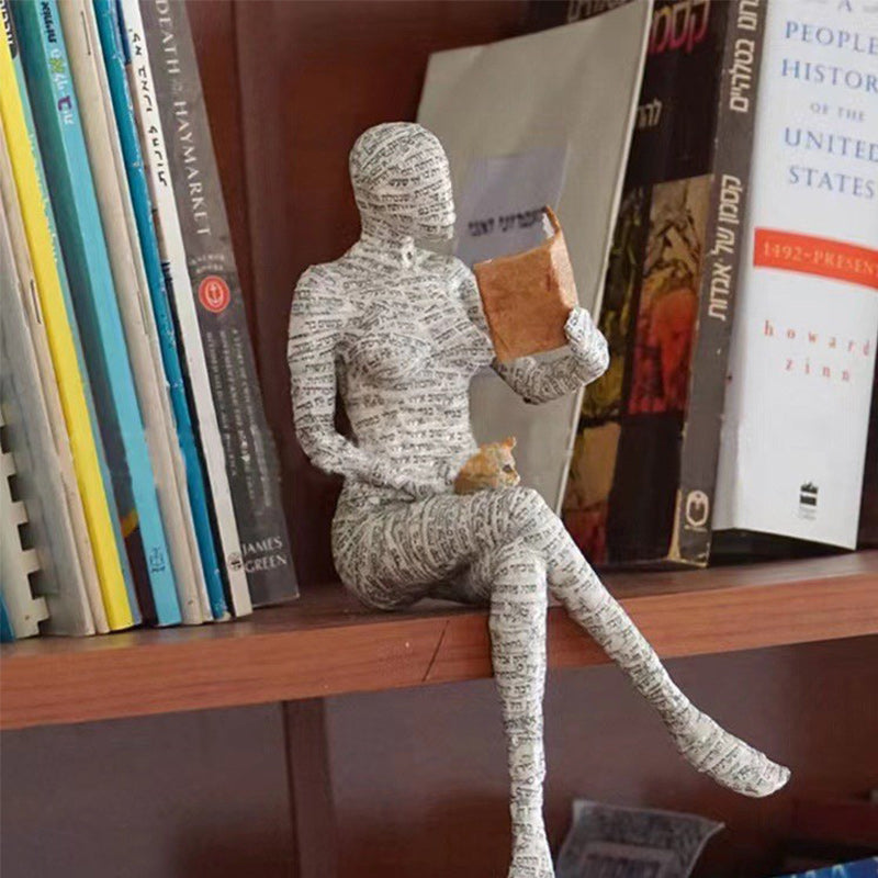 Artigianato di ornamenti in resina sotto forma di studioso