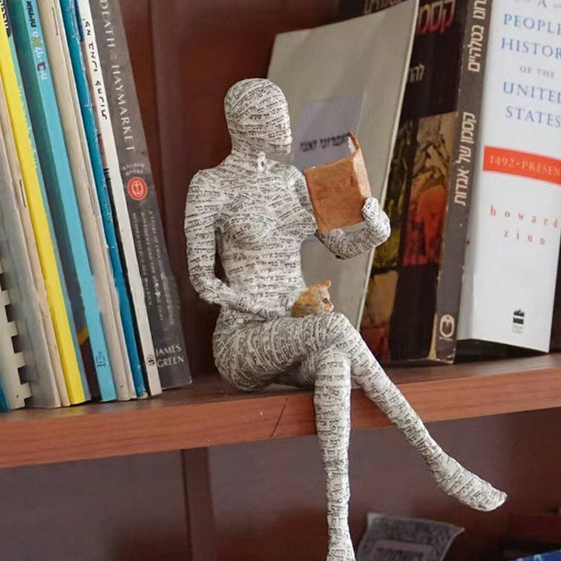 Artigianato di ornamenti in resina sotto forma di studioso
