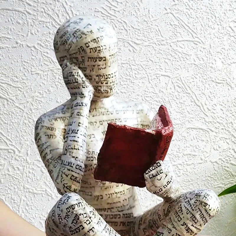 Artigianato di ornamenti in resina sotto forma di studioso