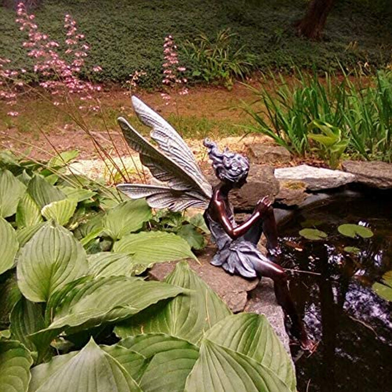 Statua del giardino delle fate sedute