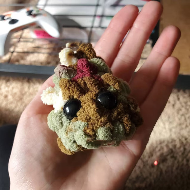 Adotta un peluche di pepite d'erba