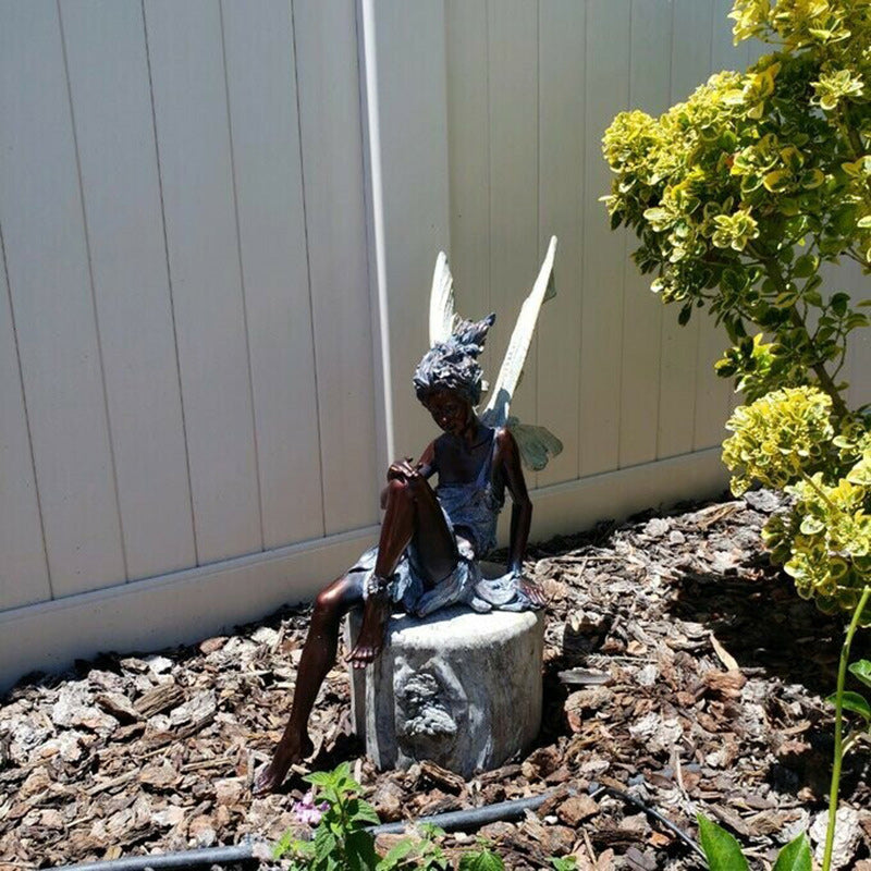 Statua del giardino delle fate sedute