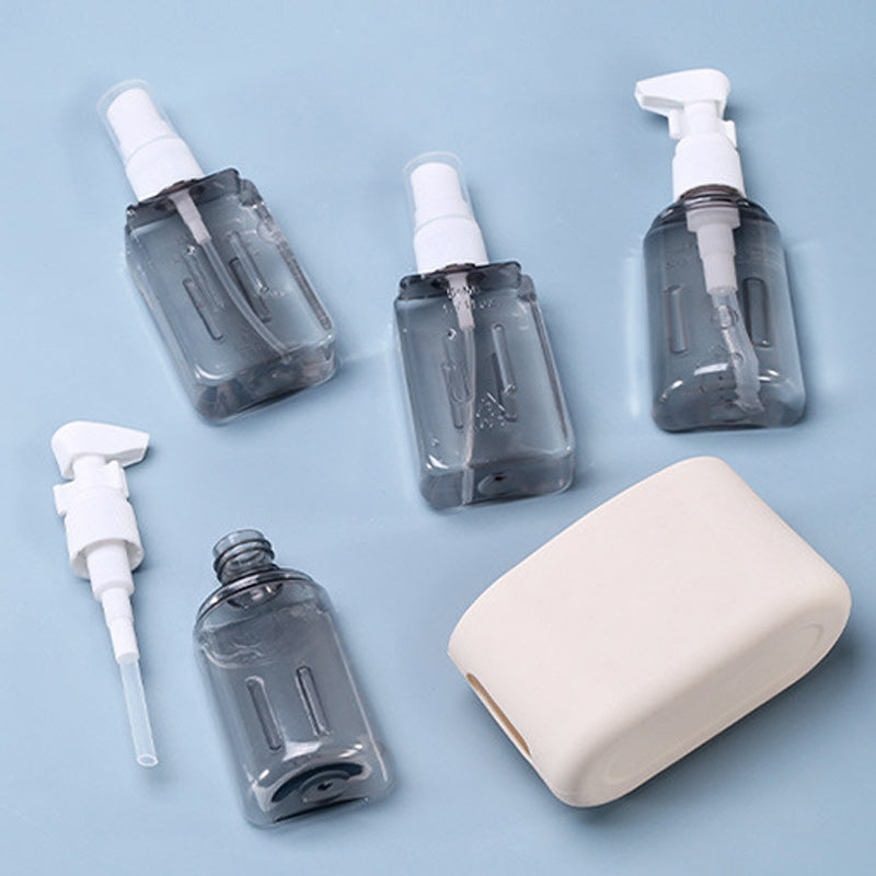 Set di bottiglie da viaggio portatili con dispenser per shampoo