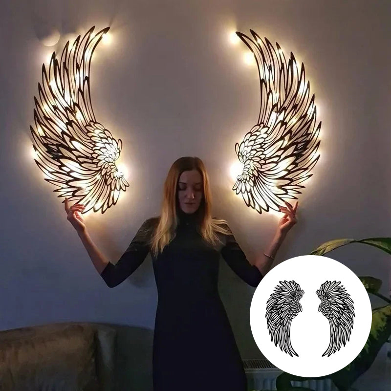 Ali d'angelo nere in metallo come arte da parete con luci a LED
